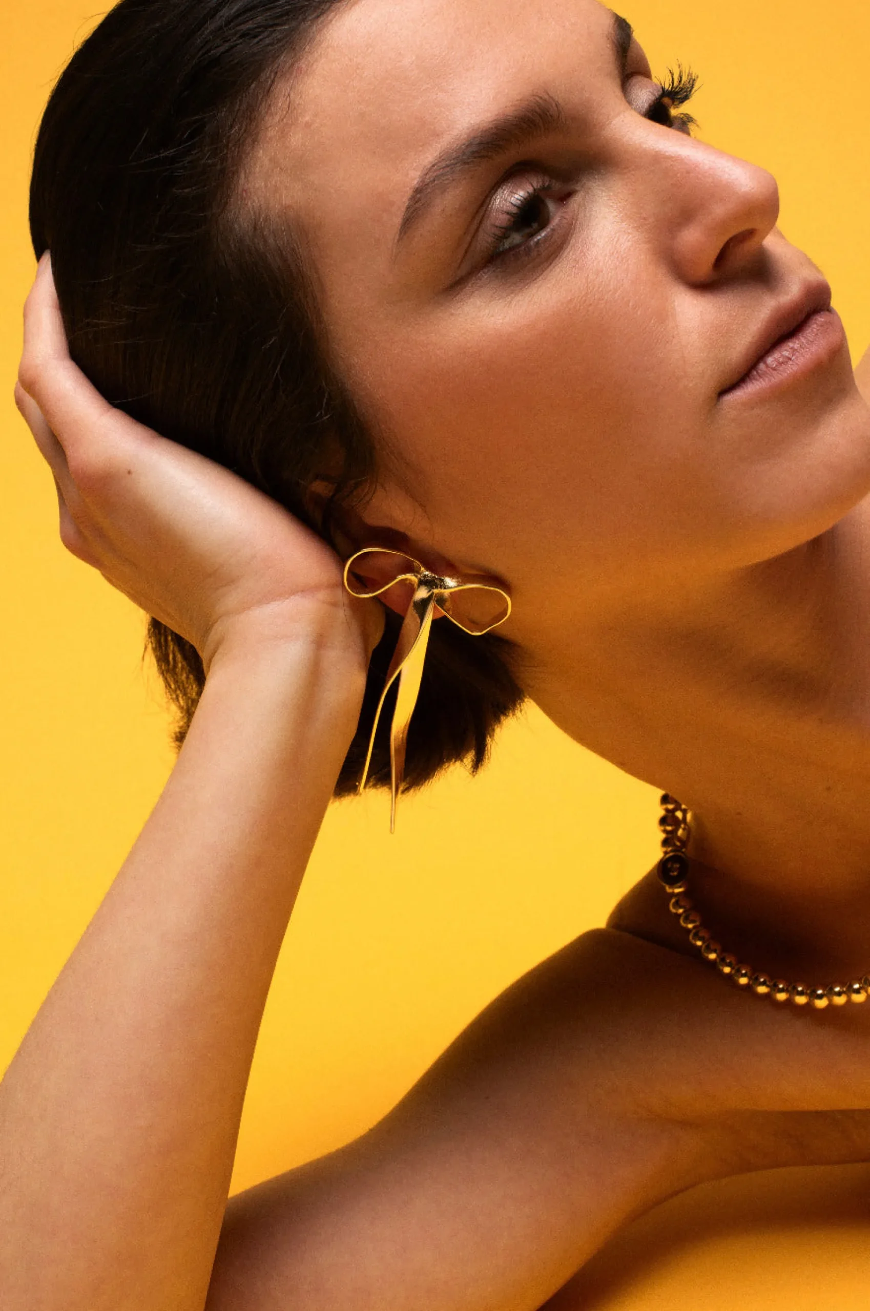 Susmie's Queen Bow Earrings Gold< Golden
